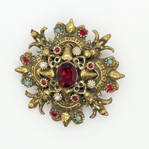 Vintage Ornate Brooch with Glittering Red Center