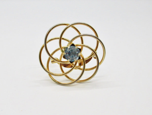 Vintage Swirl Brooch with Blue Rhinestone Center