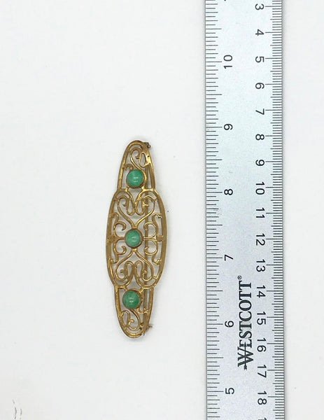 Elegant 1920s Art Deco Brooch with Green Stones - Lamoree’s Vintage