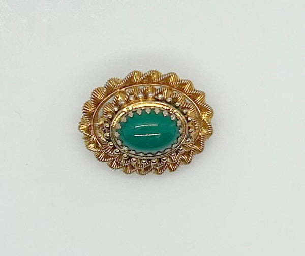 Vintage Green Oval Cabochon Brooch with Textured Setting