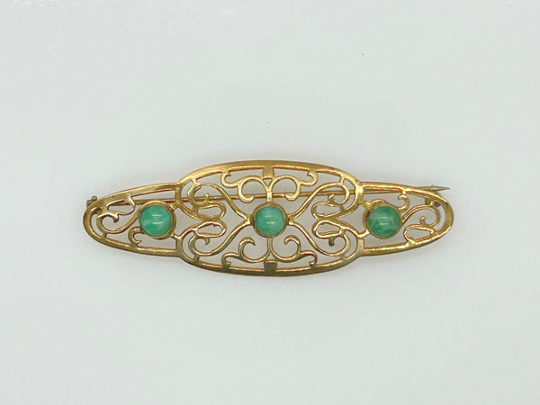 Elegant 1920s Art Deco Brooch with Green Stones