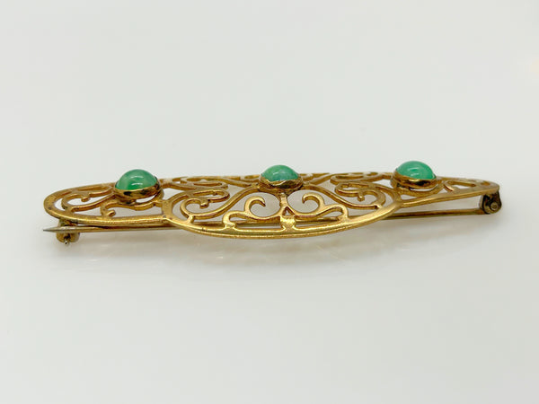 Elegant 1920s Art Deco Brooch with Green Stones