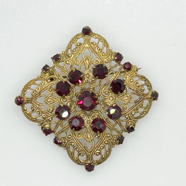 Intricate Vintage Gold Tone Brooch with Ruby Red Stones - Lamoree’s Vintage