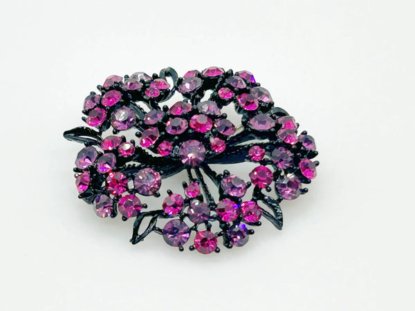 Vintage Blackened Lacy Metal Brooch with Sparkling Magenta Stones