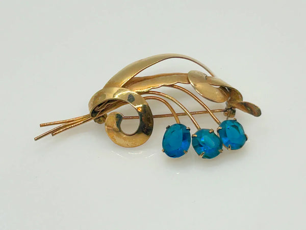 Striking Gold Filled and Oval Blue Faceted Vintage Flower Brooch